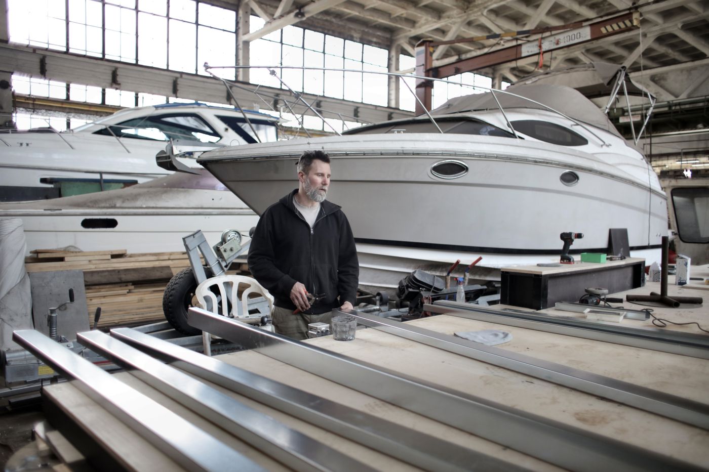 Boat workshop with motorboats and equipment